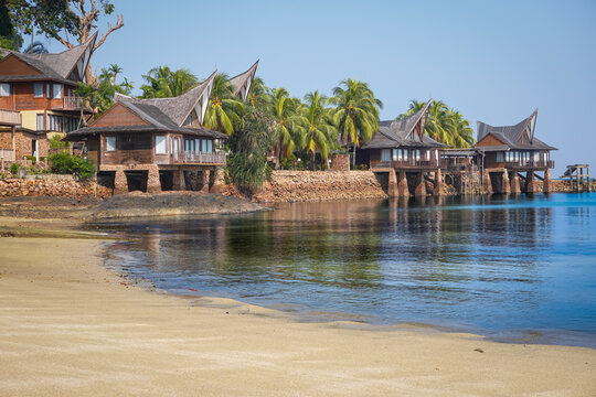 the traditional stilt villas along the coastline at Batam 