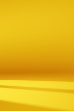 Abstract yellow background with light shadow on blank empty room wall space for vertical backdrop