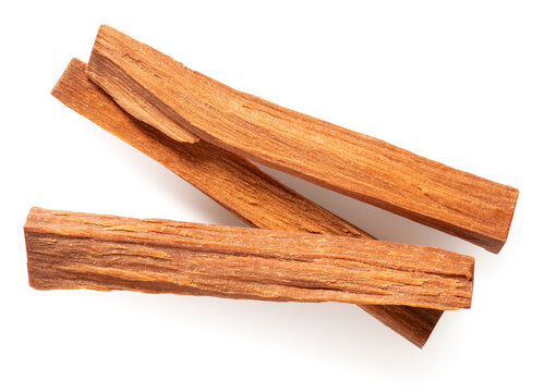 Red sandalwood sticks isolated on white background, top view.