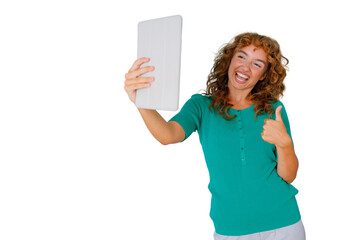 Woman with curly hair making a video call on a tablet, smiling and giving a thumbs up. Transparent background © Komora