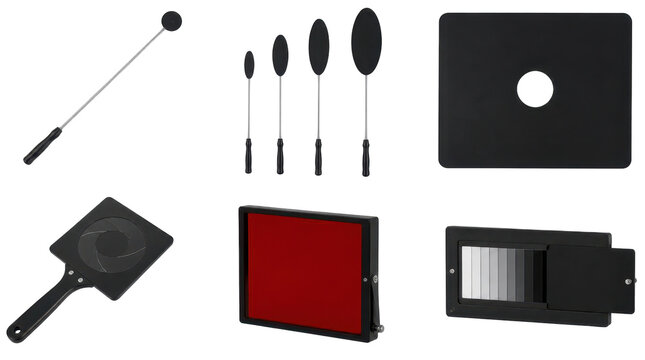 Collection of photographic lighting tools and accessories, includes light meter, diffusers, and reflectors on a white background, studio equipment for professional photography