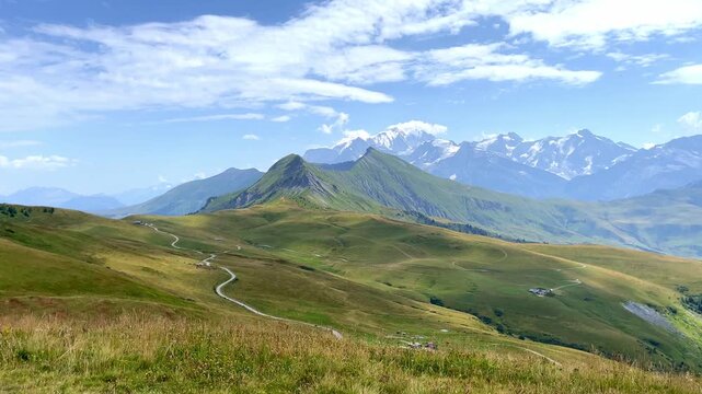 Winding Mountain Path in French Alps with Mont Blanc Summit Range View