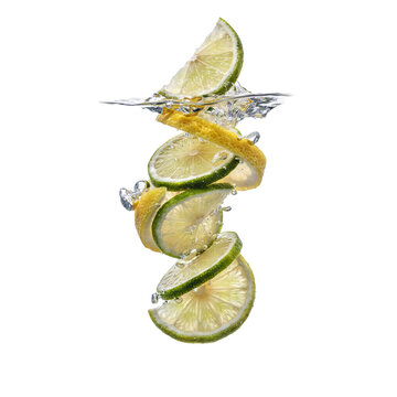 Fresh lime and lemon slices falling into clear water with bubbles and splashes isolated on a transparent background