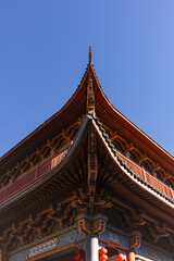 Obraz premium Traditional Chinese Temple Roof Against Blue Sky