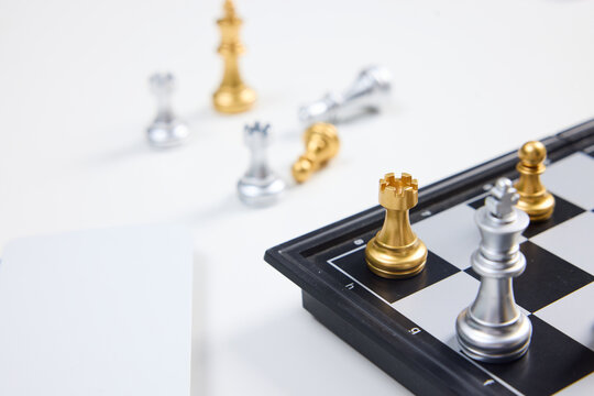 Chess Pieces on Board with Strategic Game Setup