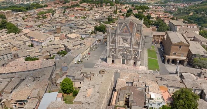 Aerial panorama of Orvieto's old town with Torre del Moro and Orvieto Cathedral rising above the historic center. It's a town in province of Terni, Umbria, Italy.