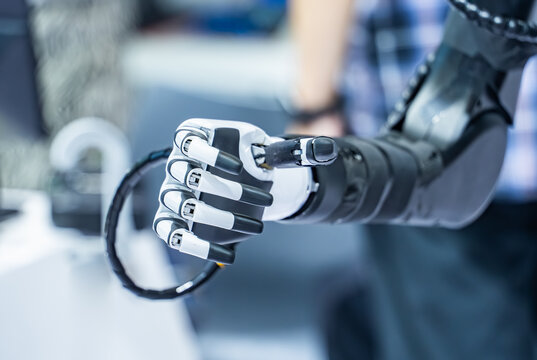 Artificial robotic hand at the presentation of robotics.Creation of artificial intelligence