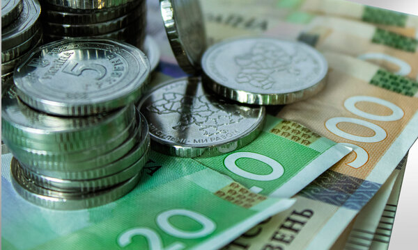 Ukrainian hryvnia coins and banknotes, close-up