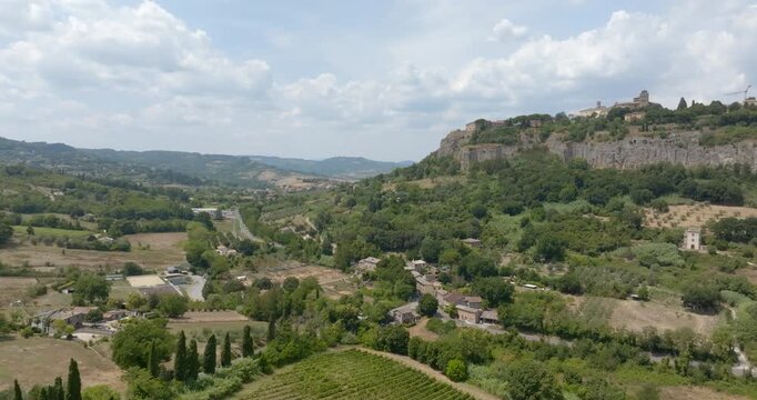 Aerial panorama of the historic hilltop town of Orvieto perched on a volcanic tuff cliff, with medieval walls, located in province of Terni, Umbria, Italy.