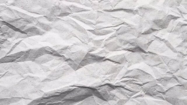 Close up view of white crumpled paper texture background.