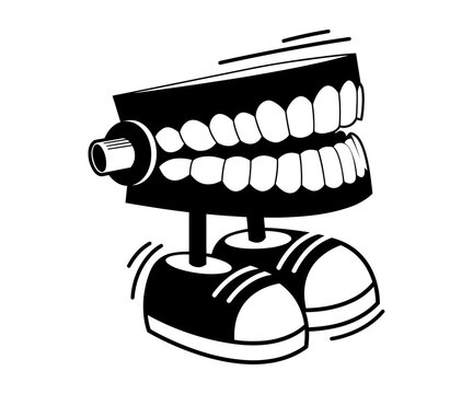 Chattering teeth wind up toy