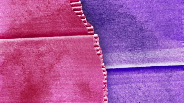 Vibrant pink and purple fabric texture abstract background.