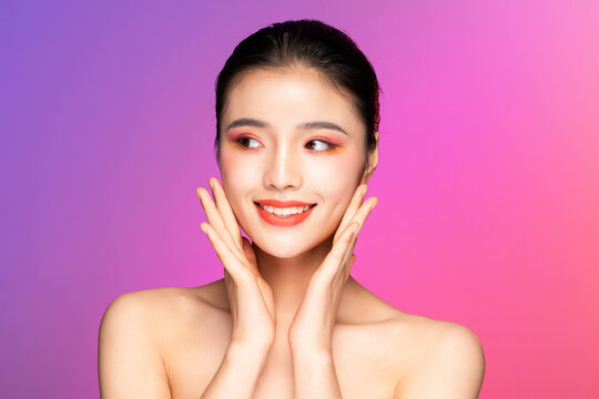 Smiling Woman With Hands On Cheeks