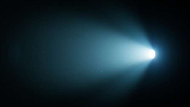 Mysterious blue spotlight beam shining in dark fog, atmospheric light rays, dramatic abstract background with lens flare, moody cinematic illumination effect