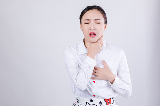 Woman Suffering Severe Sore Throat and Chest Pain