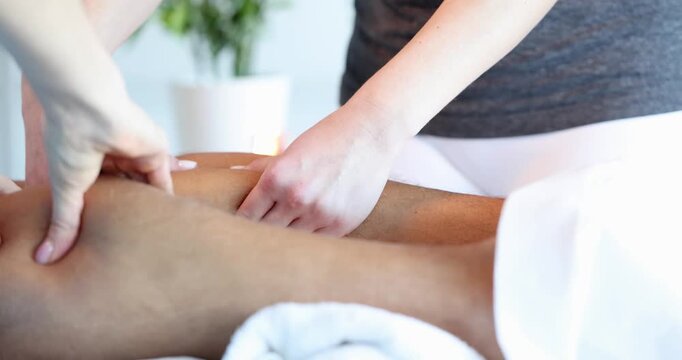 Soft hands work magic on tired muscles in a calm spa, helping to release tension and promote relaxation. Experience peace in this tranquil environment.