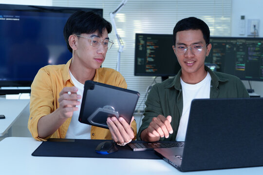 Programmers Collaborating on Software Development