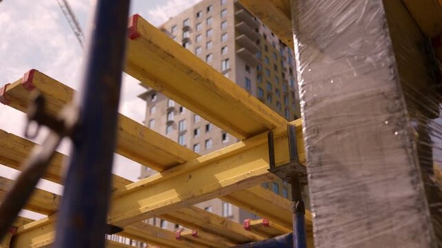 Timber formwork beams supporting floor slab construction