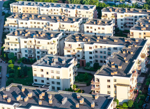 Aerial view of the Przymorze district featuring modern residential apartment buildings with flat roofs, balconies, and green spaces in Gdansk, Pomeranian Voivodeship, Poland.