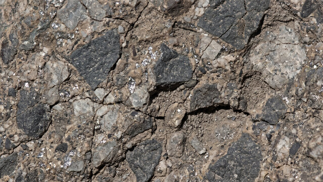 Lunar breccia surface texture with dark rocky regolith