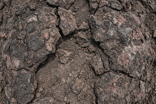 Venusian volcanic rock texture with cracked lava surface