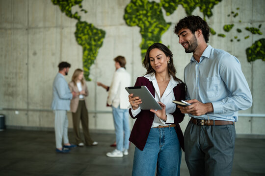 Business colleagues collaborating on digital tablet global strategy