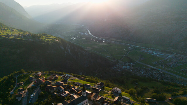 Village landscape with alps mountains 