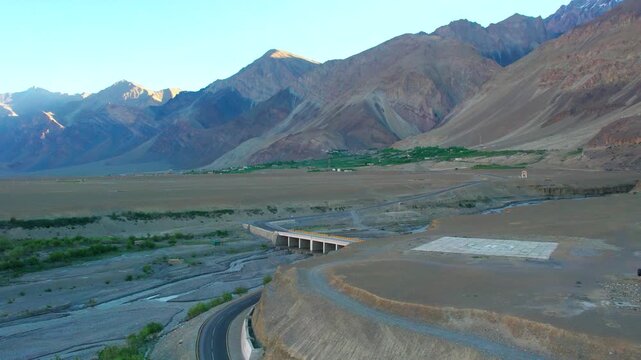 Aerial view of the deep Zanskar Gorge with its winding river and steep rocky cliffs in Zanskar, Ladakh, India.