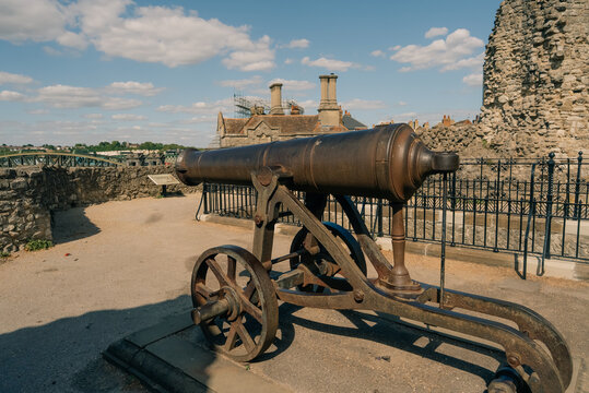 Historic cast iron cannon on a carriage in the grounds of Rochester Castle, Kent, England, UK - 4 September 2026.