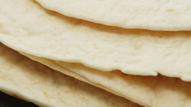 Tortilla flat bread macro close up presentation slowly rotating stock footage