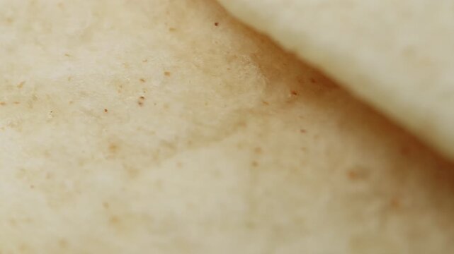 Tortilla flat bread macro close up presentation slowly rotating stock footage