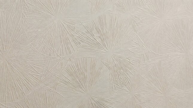 Textured plaster wall with radiating starburst pattern neutral beige background