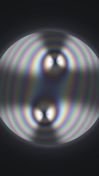 Conoscopic Interference Figure With Swinging Isogyre Brushes In Polarized Light Seamless Loop in cool gray tones vertical 9:16