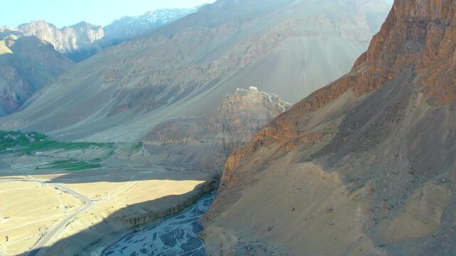 Aerial view of the deep Zanskar Gorge with its winding river and steep rocky cliffs in Zanskar, Ladakh, India.