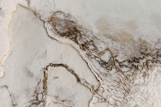 Abstract Travertine Mineral Patterns In Pamukkale Turkey Showcasing Natural Geological Formations Textures And Thermal Terrace Beauty
