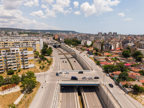 Aerial view of Bulevard Vasil Levski in Varna, showing the sunken highway section, urban residential buildings, and surrounding greenery Varna, Varna, Bulgaria.