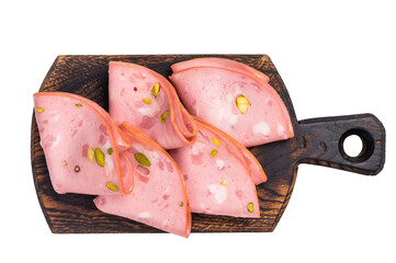 Italian Mortadella sausage slices with pistachios on wooden cutting board isolated on white background. top view © Mironov