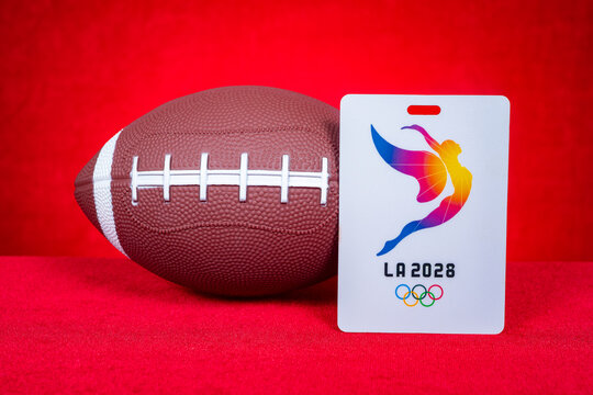 ZhongShan GuangDong China-August 23, 2026: Flag football next to LA2028 Olympic Games credential badge.