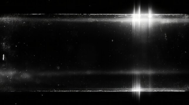 Retro film overlay texture with vintage grain, dust, scratches, noise, distressed film effects, light leaks and lens flare on black background