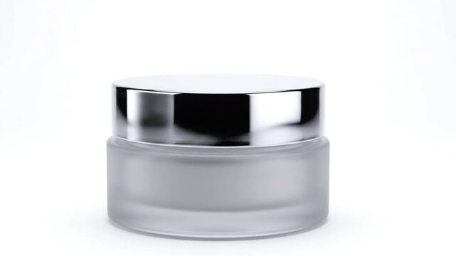 Blank frosted glass cosmetic cream jar with a shiny silver metallic cap skincare
