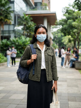 Photorealistic stock photo of an Indonesian Gen Z