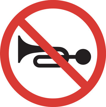 No horn sign indicating a prohibition of using vehicle horns in a specific area or zone