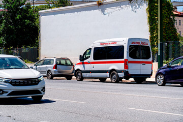 Traffic with ambulance in Lisbon, Portugal, medical transport on street. © Tomasz