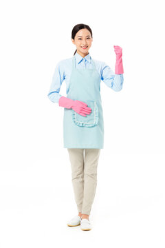 Smiling Woman in Cleaning Apron Waving Hello