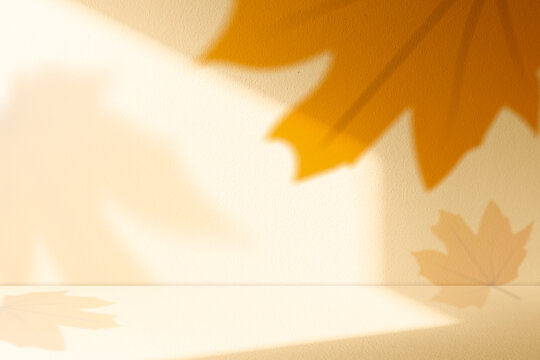 Autumn Yellow Background With Blurred Maple Leaf Shadows And Warm Sunlight On Textured Wall And Floor, Empty Interior Room Bright Light on Fall Product Display, Thanksgiving Banner And Seasonal Design