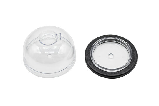 Clear plastic dome cover and circular black rubber gasket seal ring isolated on a transparent background