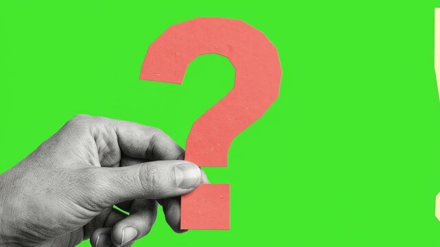 Two Hands Holding Question Mark and Exclamation Mark Signs Against Green Background