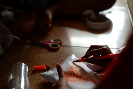 Close up of kids hands playing and learning together during group activity