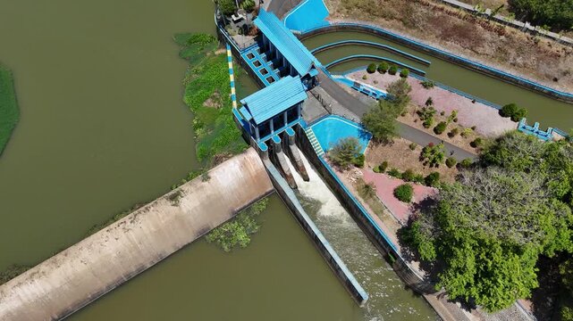Aerial view of the Karang Intan Dam structure showing low water levels during the dry season