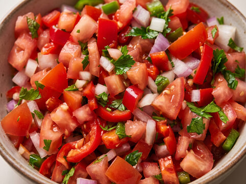 Fresh Mexican pico de gallo salsa with diced tomatoes onions and cilantro
